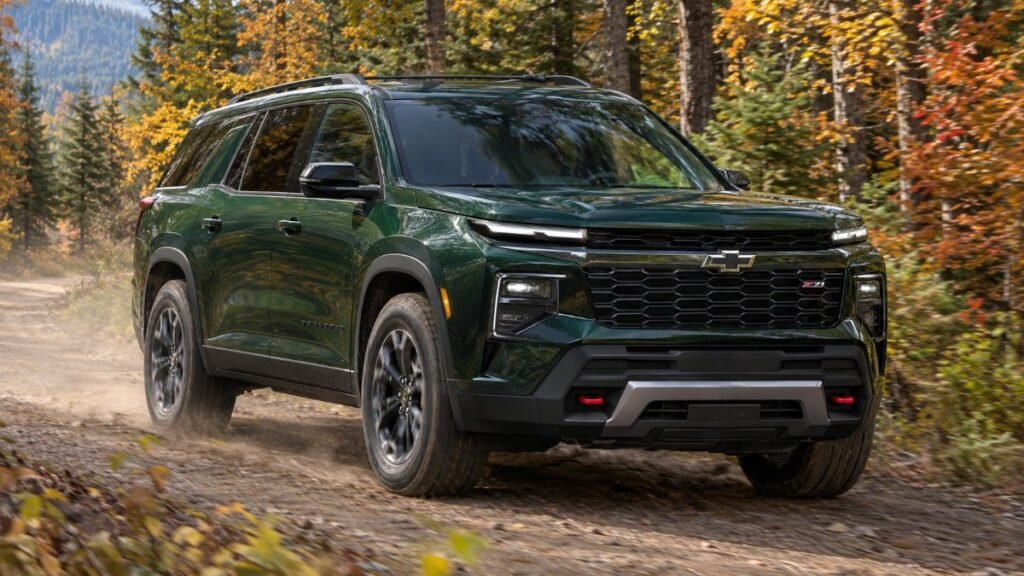 2027 Chevy Traverse Z71 in the new Trillium Green Metallic color on a forest road